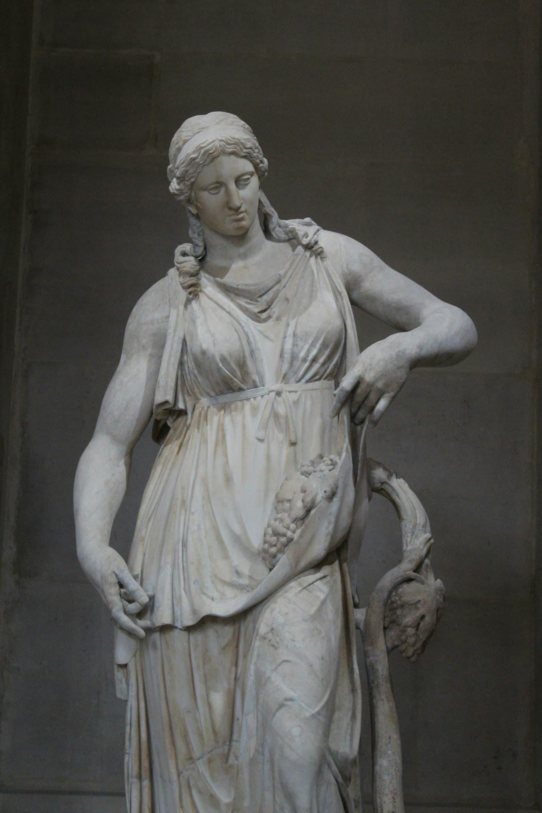 A classical marble statue in a museum